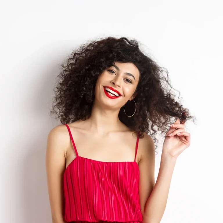 beautiful-woman-with-curly-hair-wearing-red-dress-2025-03-05-02-50-06-utc_resultat